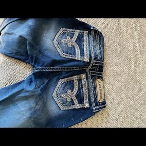Woman’s Rock Revival jeans sz 28.